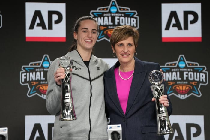 Mar 30, 2023; Dallas, TX, USA; Iowa Hawkeyes guard Cailin Clark (left) and Indiana Hoosiers coach Teri Moren accept the AP Player and Coach of the Year awards at American Airlines Center.